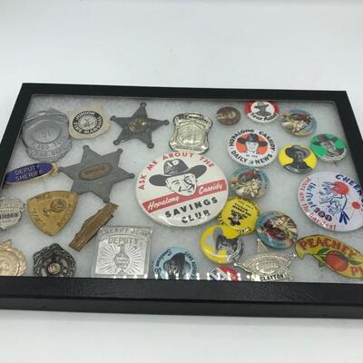 In this lot you will find sheriff badges and cowboy buttons. Cowboy pins feature Roy Rogers, Hopalong Cassidy, The Lone Ranger, Gene...