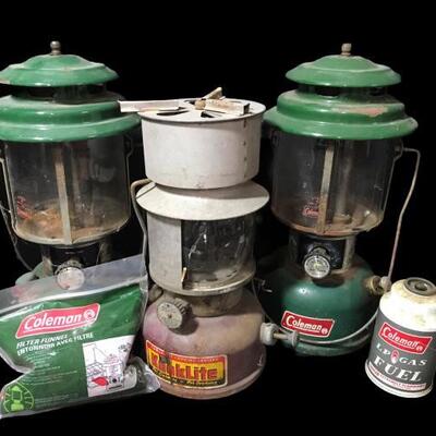 This lot contains 2 Coleman and a Kooklite Kerosene Lantern, one LP Gas Fuel, and Filter Funnel....