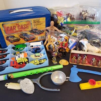 Includes Matchbox cars with case, plastic musical instruments, Rag time band and other vintage toys....