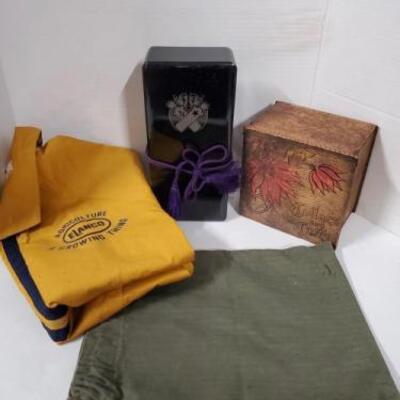 Two vintage storage boxes, and an Elanco jacket size medium with original tag.
Cuffs and Collars box has wood burning detail and measures...