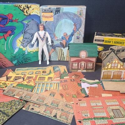 Two vintage Spiderman puzzles, cannot verify if all pieces are there. Cardboard town comes with school, fire station, Union Station,...