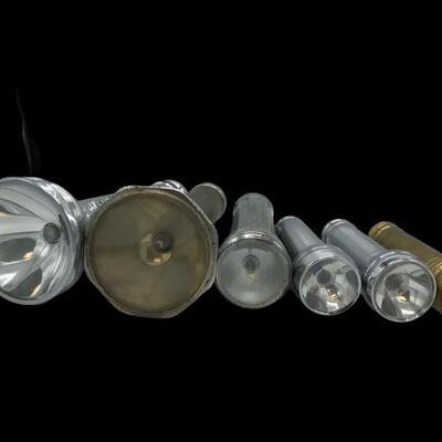 Collection of vintage flashlights, includes Ray-o-Vac, Ranger and others. We were unable to test due to no batteries. Largest- 3â€ x...