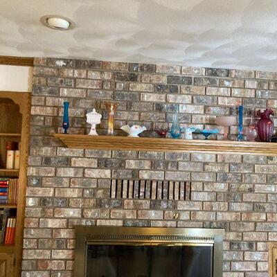 Mantle full of glassware