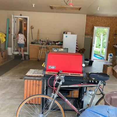 Garage. Bike, grill & Sue.