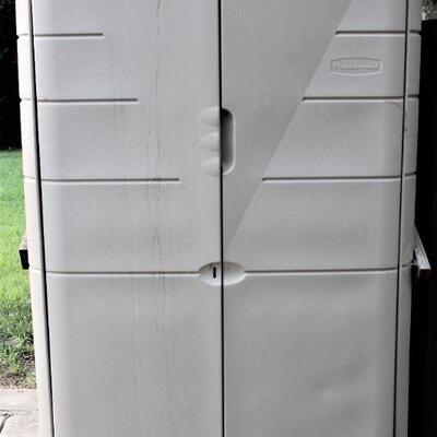 Large, upright Rubbermaid weather-proof storage container.