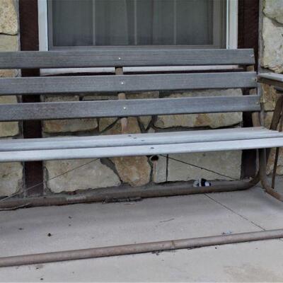 Take a load off your feet in this bench glider.