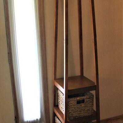 Entry hall tree with woven storage drawers. 