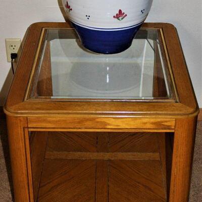 Glass top oak end table.