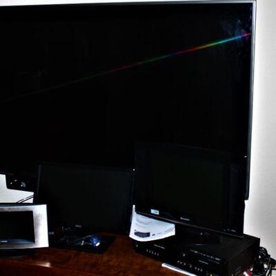 60" Flat screen television.