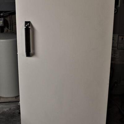 Montgomery Ward 16 cubic foot upright freezer.