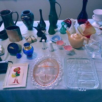 Large  Assortment of Glassware on Each Driveway