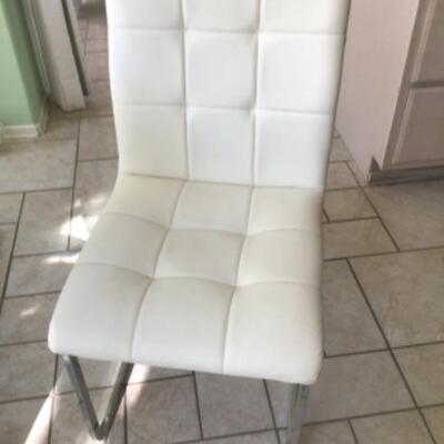 Glass top table and 4 chairs $145. 