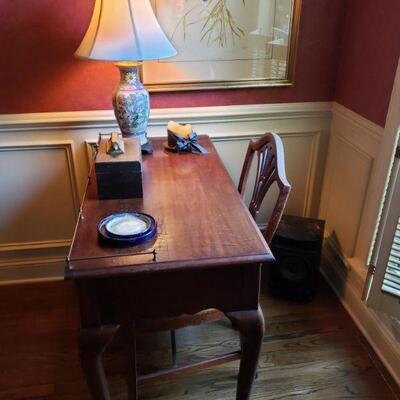 desk with 3 drawers and brass railing $225.00