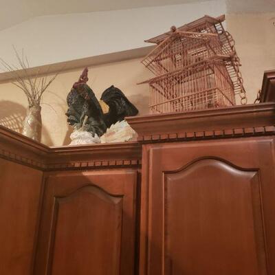 wooden bird cage and rooster