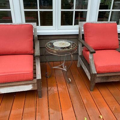 Pair of teak chairs (foot rests not pictured)