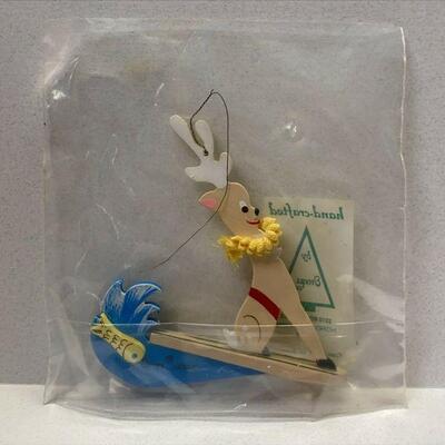 https://www.ebay.com/itm/124963978221	NC551 VINTAGE EMQEE CORP HAWAII CHRISTMAS ORNAMENT SURFING REINDEER NEW UNOPENED		Auction Starts...