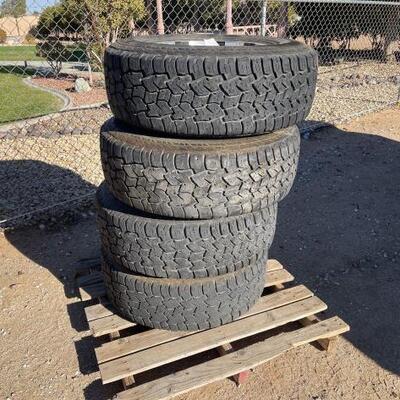 #1060 â€¢ 4 Wheels & Tires: LT265/75R16 8 Lug 16â€ wheels
