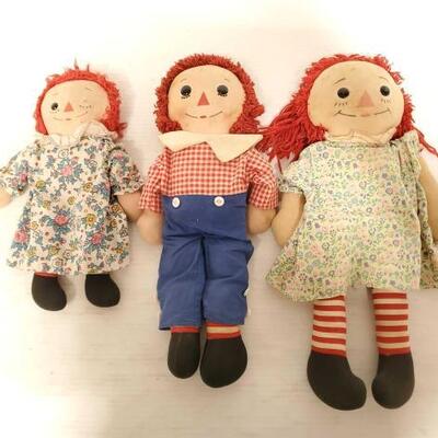 #10000 â€¢ 2 Raggedy Ann And 1 Raggedy Andy Dolls
