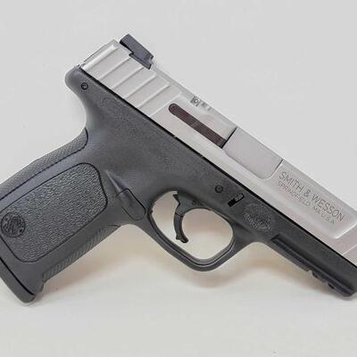 #234 â€¢ Smith & Wesson SD40 40 S&W Semi-Auto Pistol. Serial Number: FDH9865 Barrel Length: 4" Includes Two 10 Round Magazines.