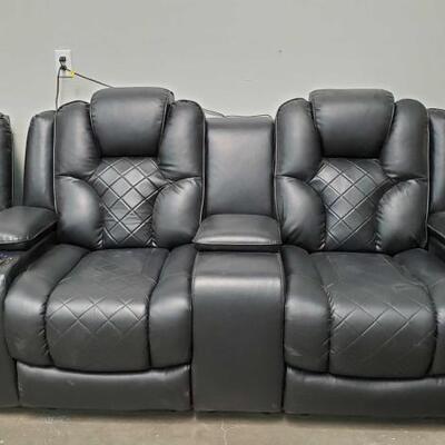 #2801 â€¢ Black Leather Love Seat: Black Leather Love Seat Measurements: Height: 43" Length: 72" Width: 32".
