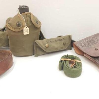 #2700 â€¢ Antique Smith & Wesson Belts Buckle, Vintage U.S. Army Canteen, Holster, Gun Cleaning Kit, and More
