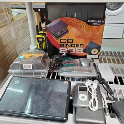 #2860 â€¢ CD Binder, Laptop, Walkie Talkies, Ipod and Mo.re. CD Binder, Laptop, Walkie Talkies, Ipod and More..