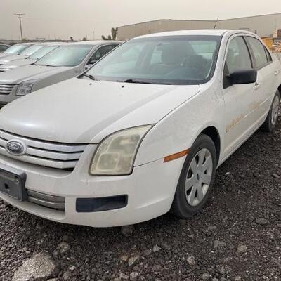 Lot 102: Year: 2008
Make: Ford
Model: Fusion
Vehicle Type: Passenger Car
Mileage: 94712
Plate:
Body Type: 4 Door Sedan
Trim Level: S...