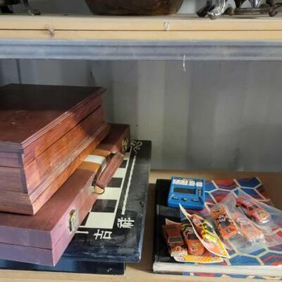 #5502 â€¢ Games, Toy Cards, Chess Pieces and Airplane Book.