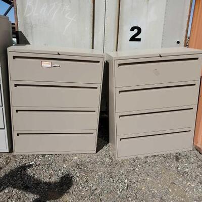 #30002 â€¢ 2 Metal Filing Cabinets: Both Measure Approx: 42" x 19" x 53".