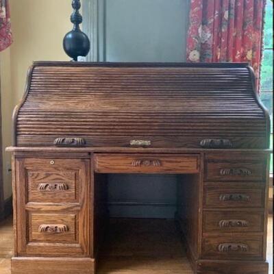Winners Only Rolltop Desk with bear claw pulls. Matching filing cabinet available
