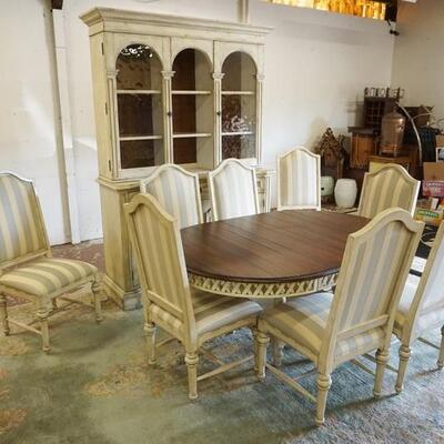 1221	HOOKER SUMMERGLEN DINING ROOM SUITE, BREAKFRONT, TABLE, & 8 CHAIRS. BREAKFRONT HAS WAVY GLASS DOORS ON EITHER SIDE & A...