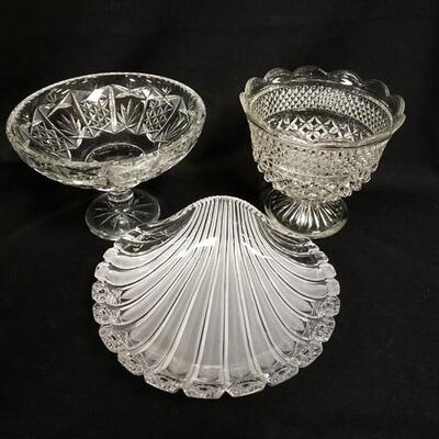 1108	3 PIECE GLASS LOT, CUT COMPOTE, CUT SHELL DISH & PRESSED COMPOTE, TALLEST IS 7 1/2 IN
