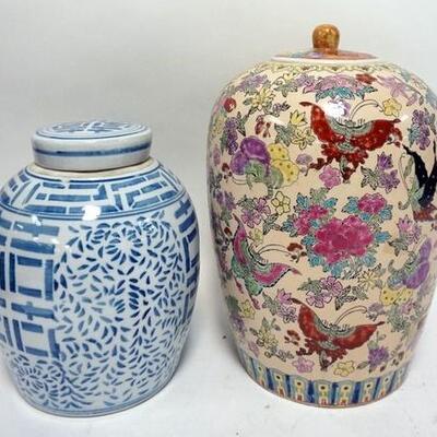 1288	2 ASIAN JARS, ONE BLUE & WHITE, ONE W/FLOWERS & BUTTERFLIES, TALLEST 14 IN
