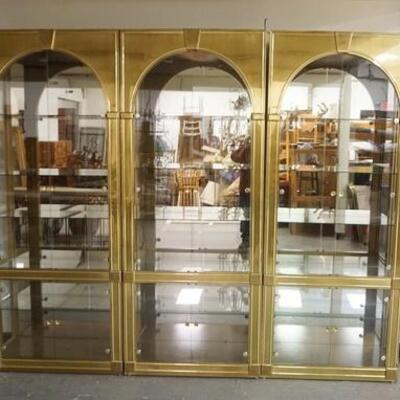 1156	3 BAKER MASTERCRAFT BRASS DISPLAY CABINETS, MIRROR BACK & GLASS SHELVES, EACH IS 34 IN WIDE X 15 3/4 IN DEEP X 84 1/4 IN HIGH
