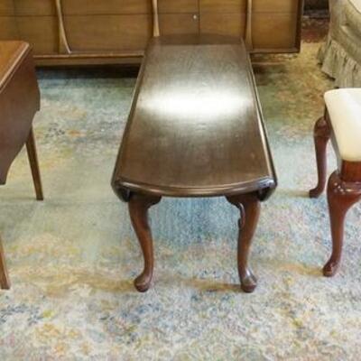 1235	LOT OF THREE PIECES OF FURNITURE INCLUDING A DROP LEAF COFFEE TABLE, A STOOL W/ UPHOLSTERED TOP & A SMALL DROP LEAF TABLE 
