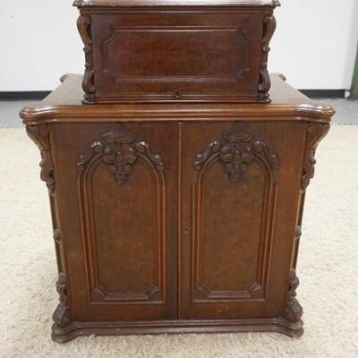 1181	EXCEPTIONAL VICTORIAN SINGER SEWING MACHINE IN A CARVED CASE, MACHINE HAS ORIGINAL LITHO & MOTHER OF PEARL INLAY, FINISH WEAR ON...