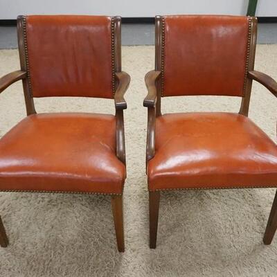 1180	PAIR OF ORANGE/BROWN LEATHER ARM CHAIRS
