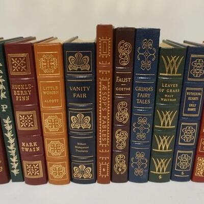 1152	11 EASTON PRESS CLASSIC LEATHER BOUND BOOKS, INCLUDES HUCKLEBERRY FINN, LEAVES OF GRASS, GRIMMS FAIRY TALES, ETC
