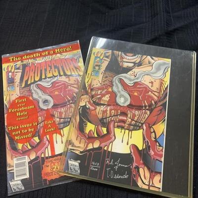 (2) Protectors Comic Books, 1 is Autographed