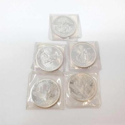 #2422 â€¢ (5) .999 Fine Silver Coins, 5ozt Weighs Approx: 5otz Includes (3) 1985 American Prospector Coins and (2) Silver Trade Units.