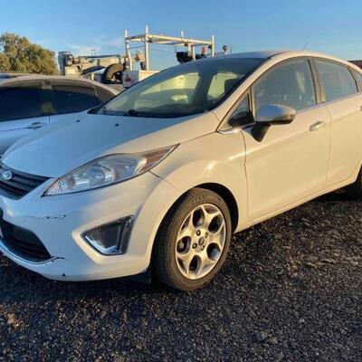 #144 â€¢ 2011 Ford Fiesta Year: 2011
Make: Ford
Model: Fiesta
Vehicle Type: Passenger Car
Mileage: 90878
Plate:
Body Type: 4 Door...