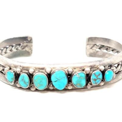 #614 â€¢ Vintage Navajo Native American Sterling Silver Turquoise Coiled Cuff: This beautiful vintage navajo cuff has seven engraved...