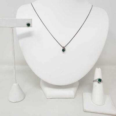 #2150 â€¢ 10k Pendant, Earrings and Ring with Diamonds Matching Set, 6g: Weighs Approx: 6g Ring Size: 5 Chain is Sterling Silver.