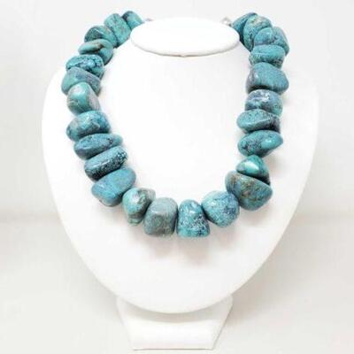 #1380 â€¢ Dyed Howlite Boulder Necklace- 323.4g The largest turquoise stone measures about 1" x 1". The length of the necklace...