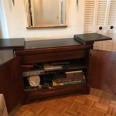 Thomasville Mystique 	Expendable flip to buffer serving cabinet 
