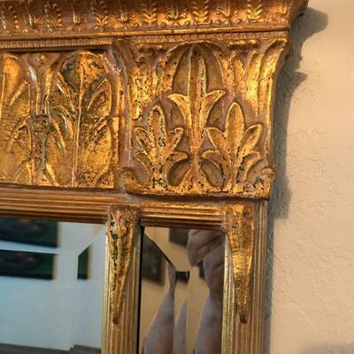 Gold plaster beveled glass mirror in the Trumeau or Deco style, measures approx. 32â€ high x 26â€ wide