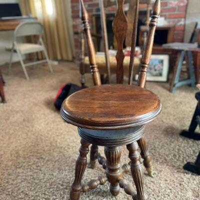 Antique Swivel Piano chair with metal at the base