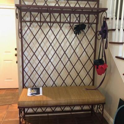Custon wrough iron coat rack with custom pillow