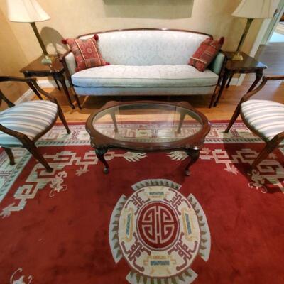 2 chairs, settee, table, rug