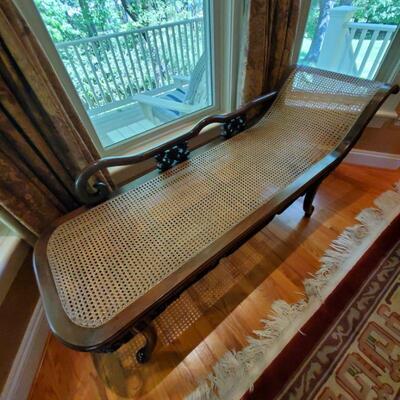 Antique walnut chaise, cane insert